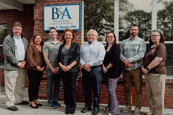 Bookkeeping and Accounting Staff Photo in front of office